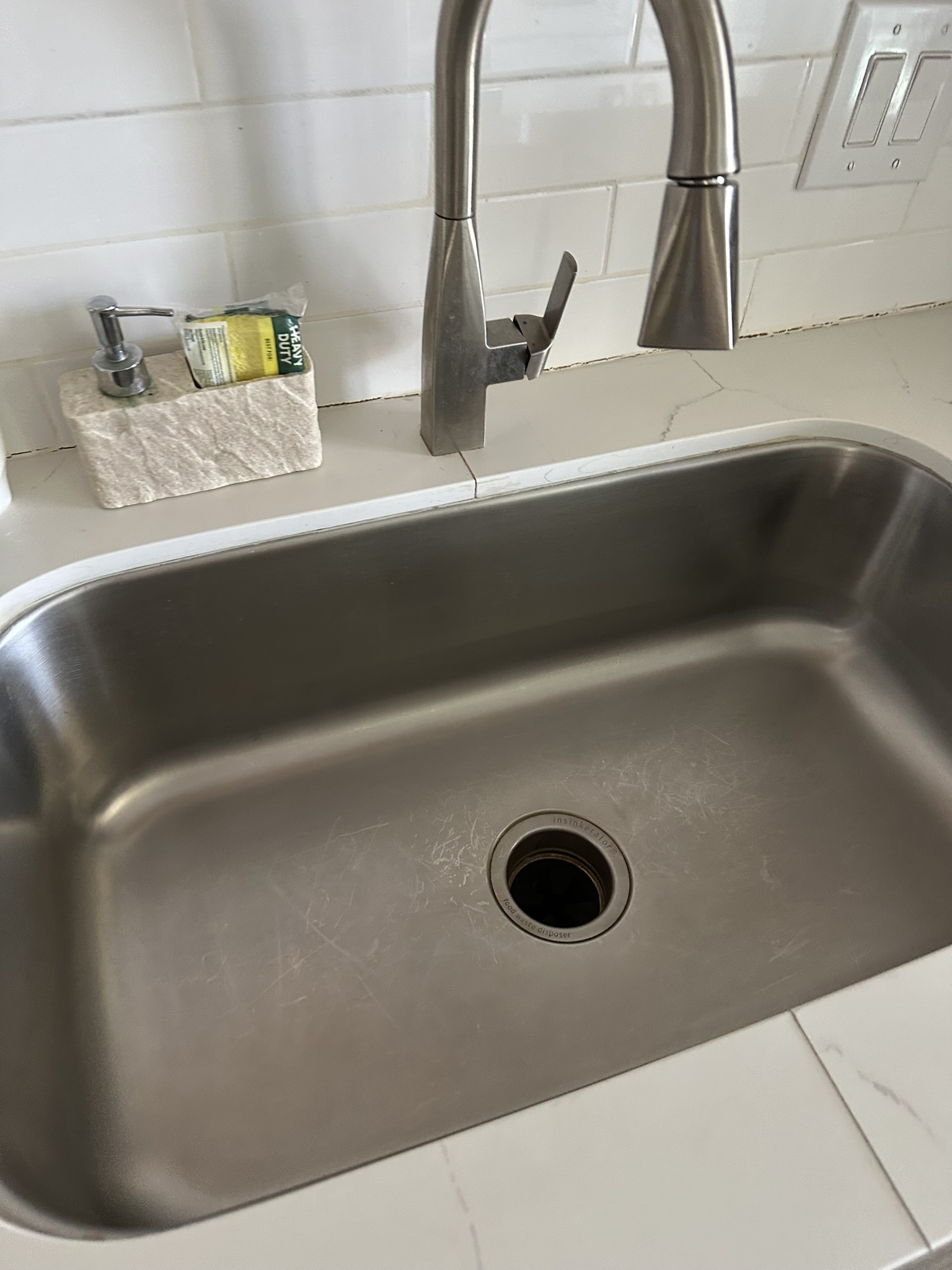 Kitchen sink after STR turnover cleaning