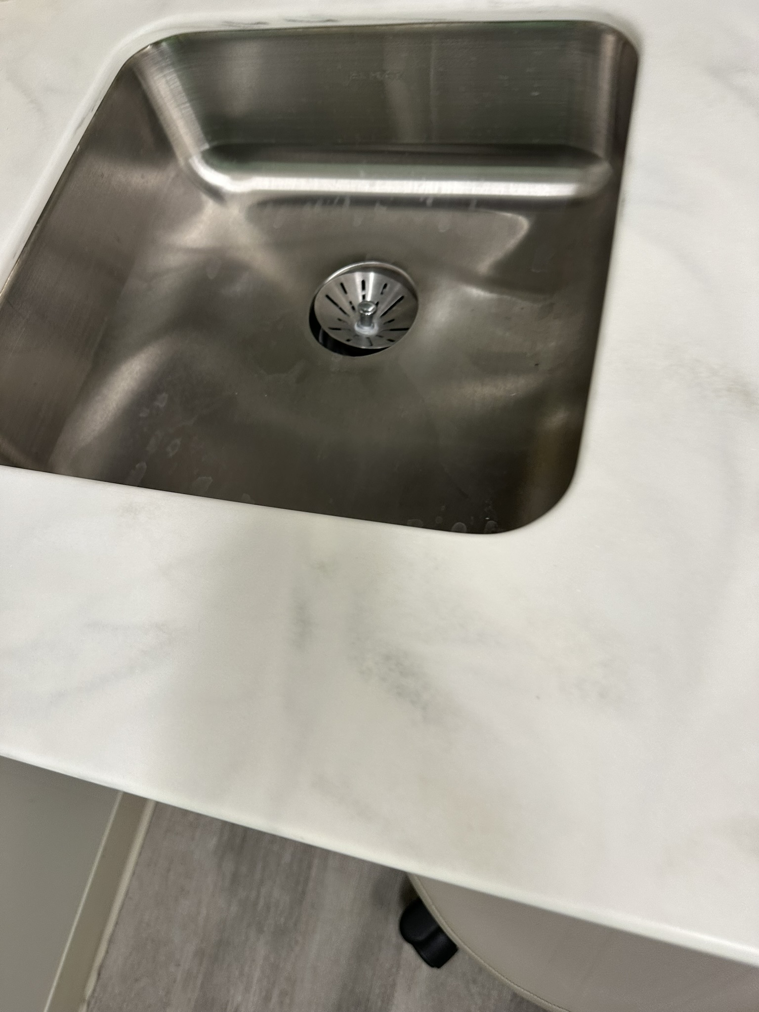 Staff sink and counter area reviewed during medical clinic inspection