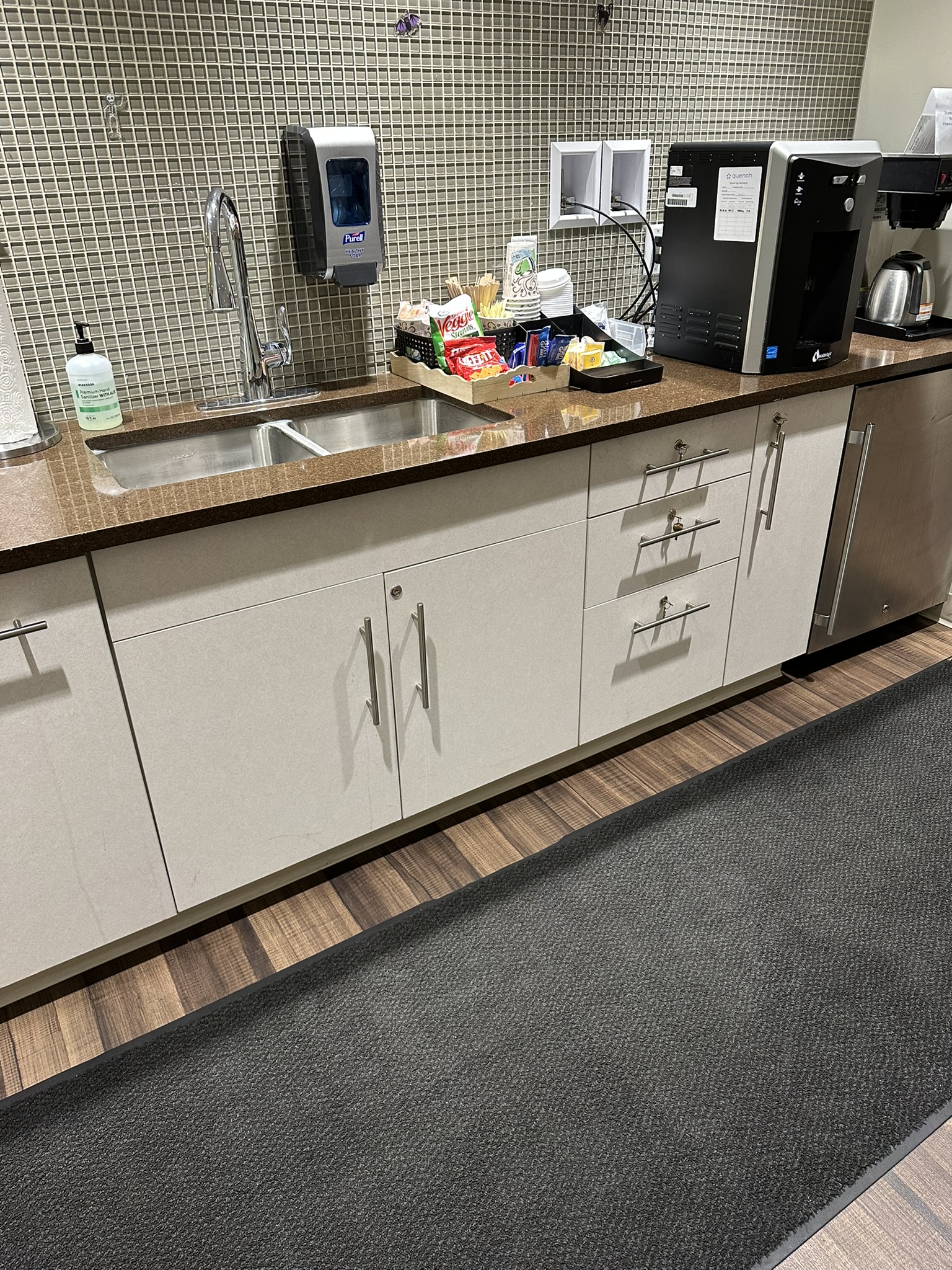 Medical clinic staff break area and cabinetry