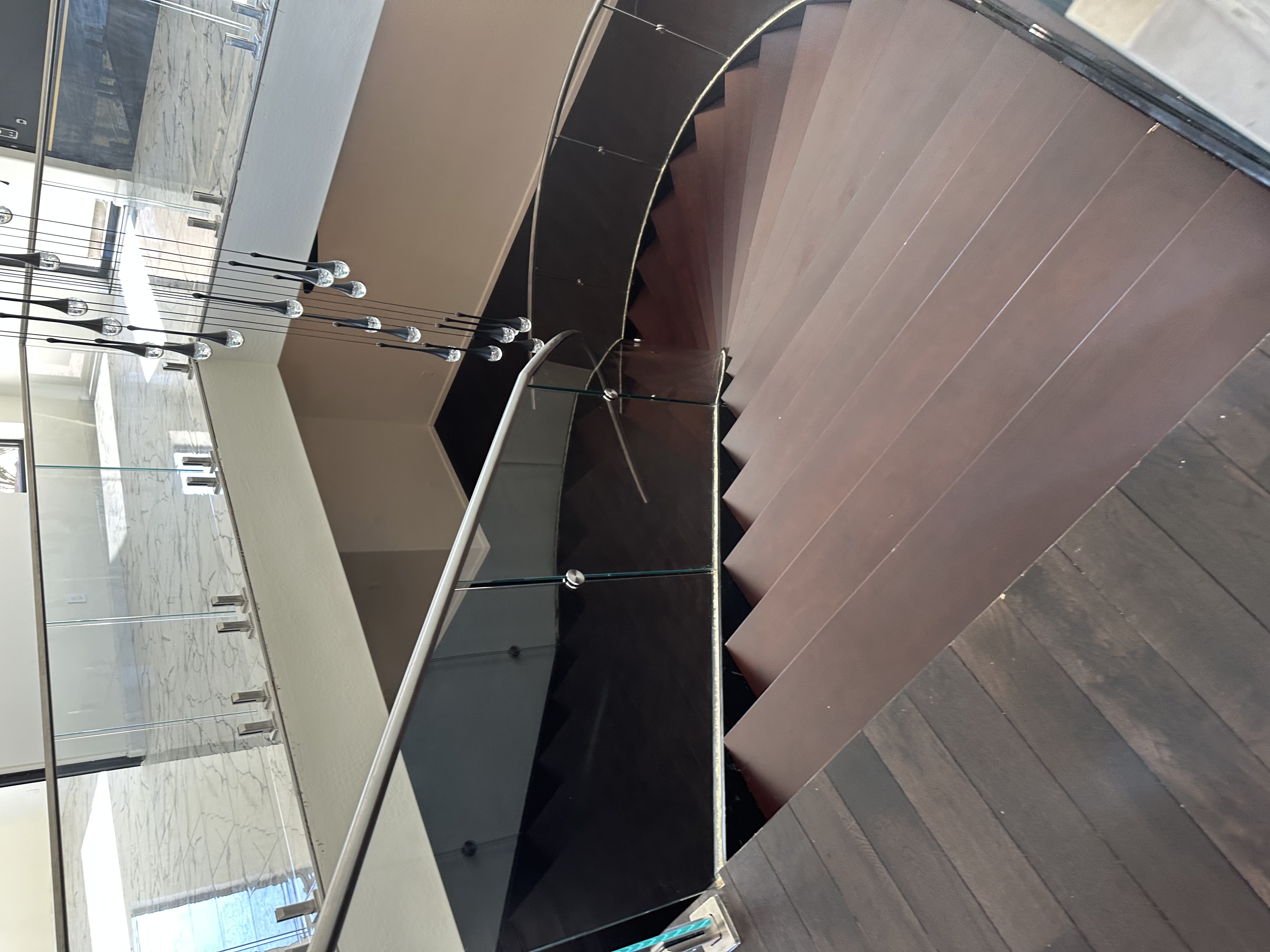 Staircase and glass rail after construction cleaning