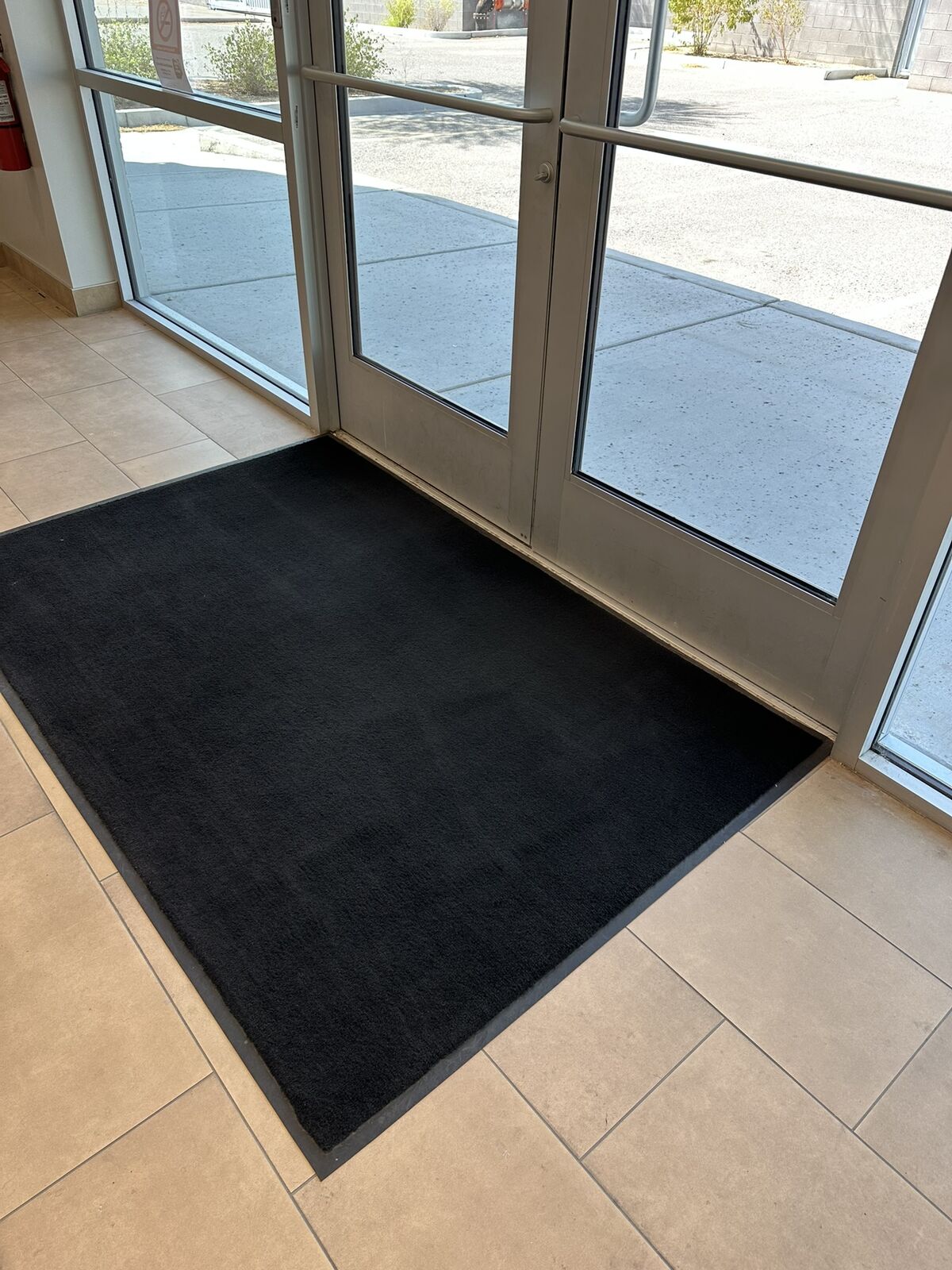 Warehouse entry mat and entrance after janitorial cleaning