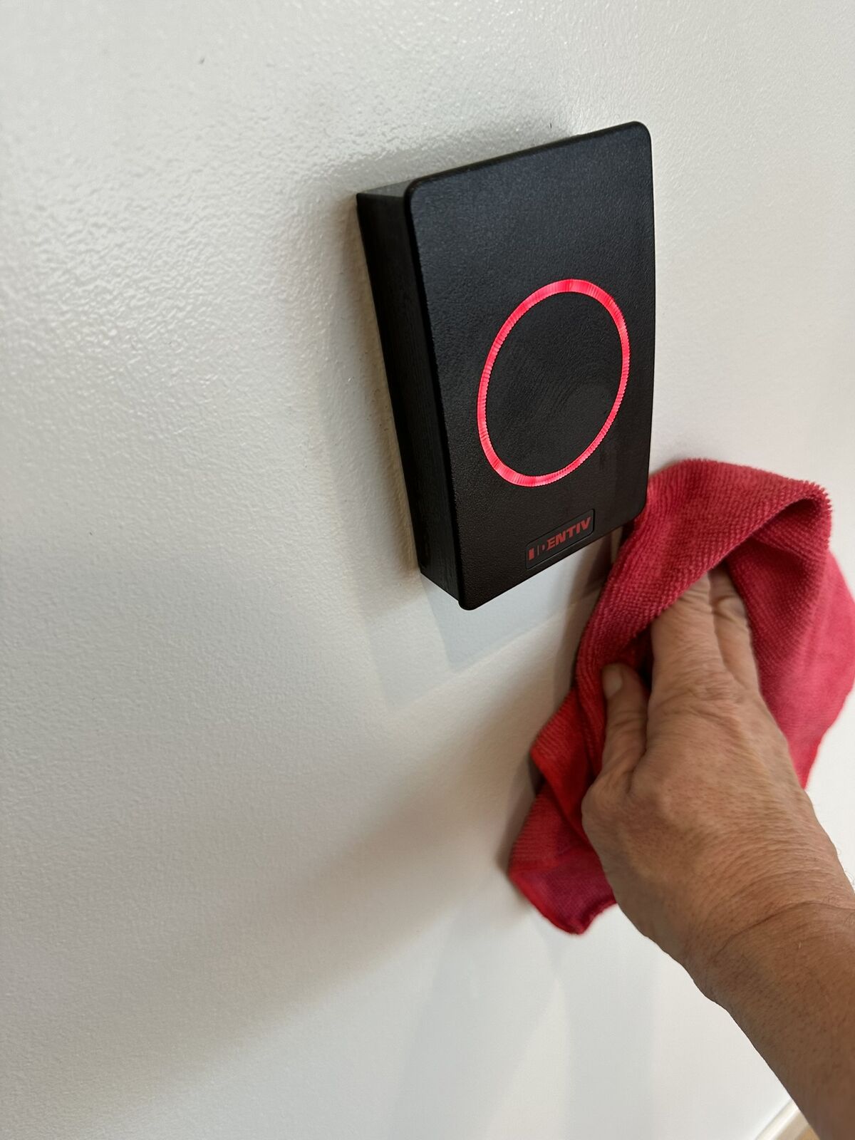 High-touch wall panel detailed during warehouse cleaning