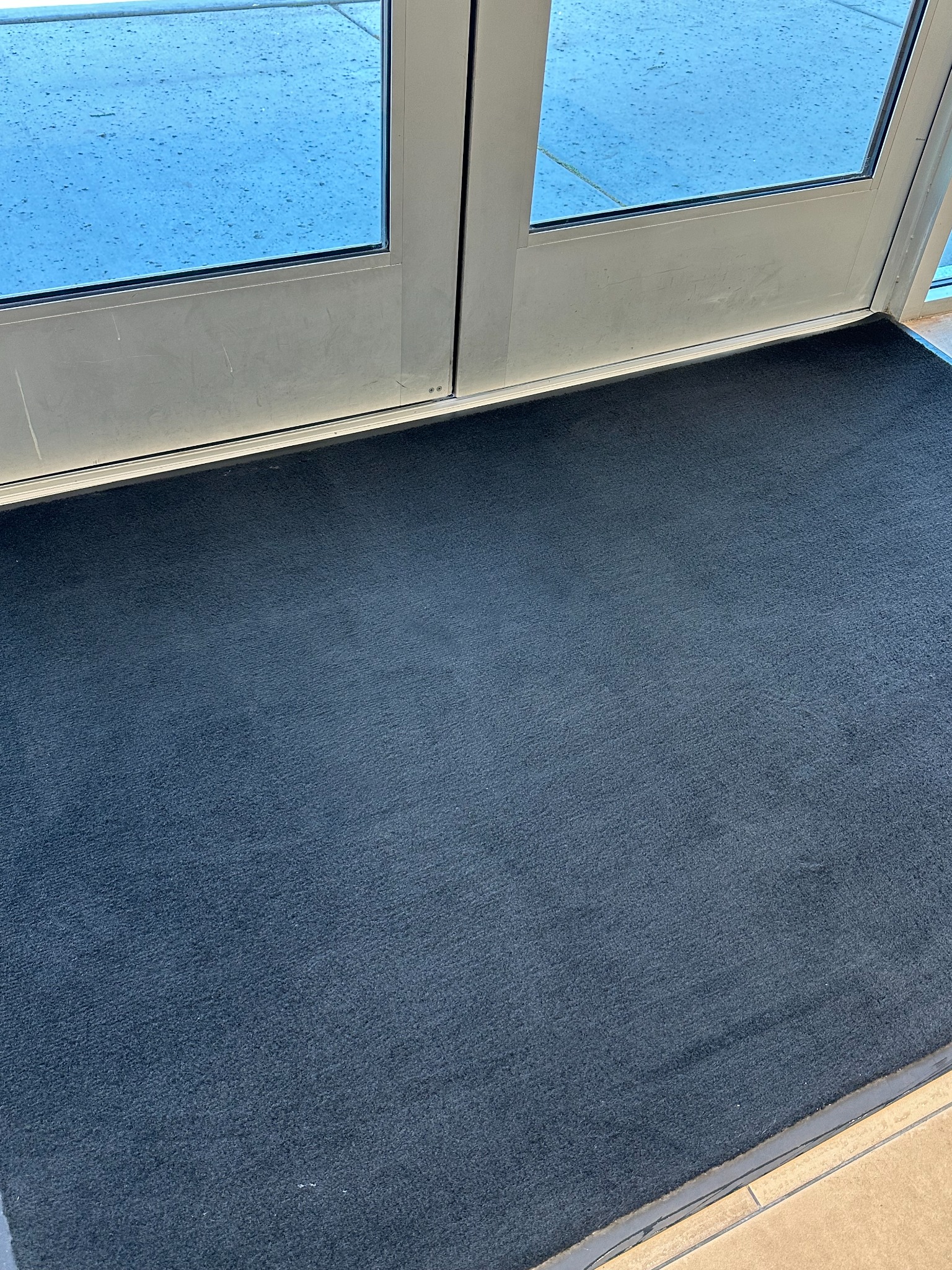 Clean commercial entry mat after detail cleaning in a Phoenix facility