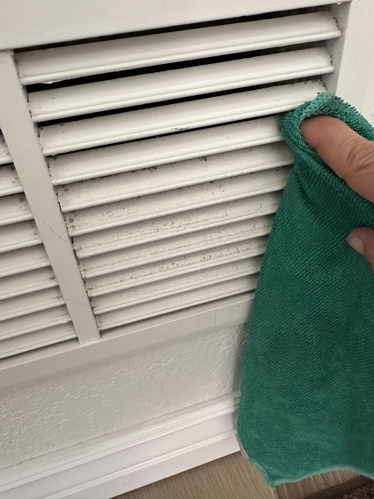 Dust buildup on an air return vent in a Mesa vacation rental