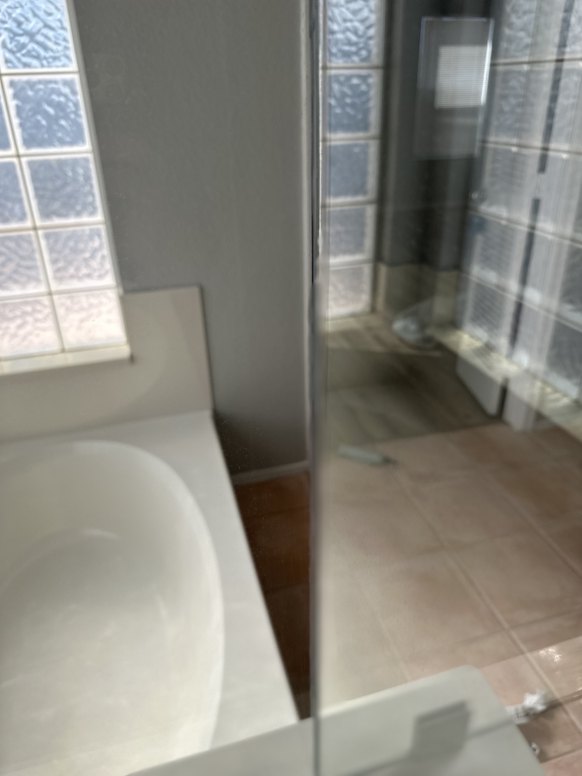 Shower glass after detailed move-out cleaning in Peoria