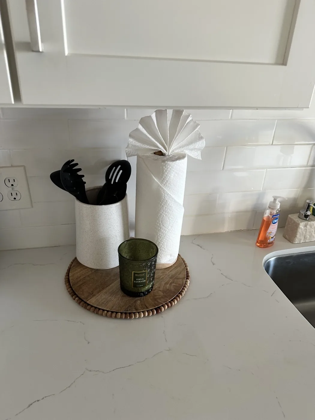 Kitchen countertop with organized guest amenities