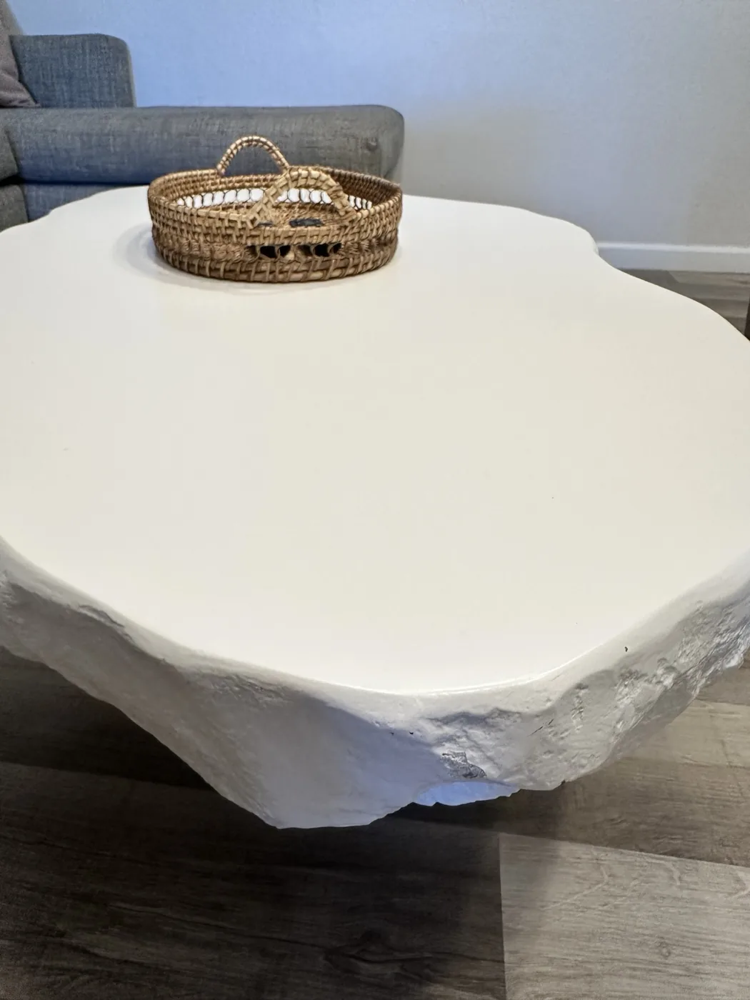Clean living room coffee table and decorative basket
