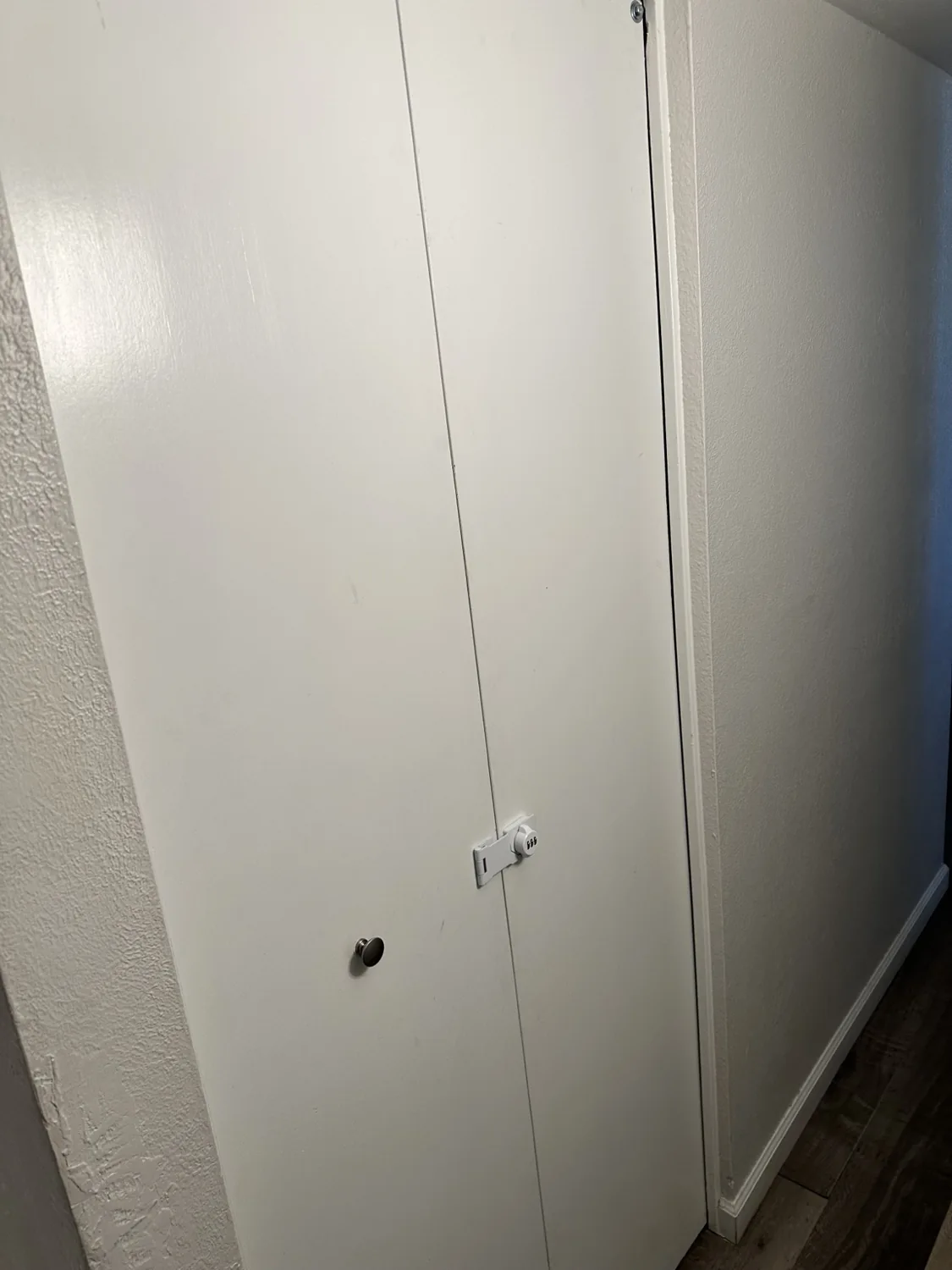 Closed supply closet with a latch for controlled access